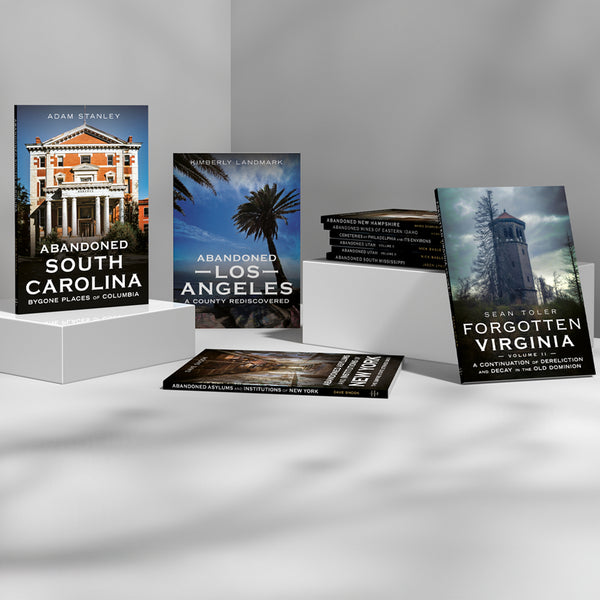 Collection of books on abandoned places in different states on a gray background. Featured: