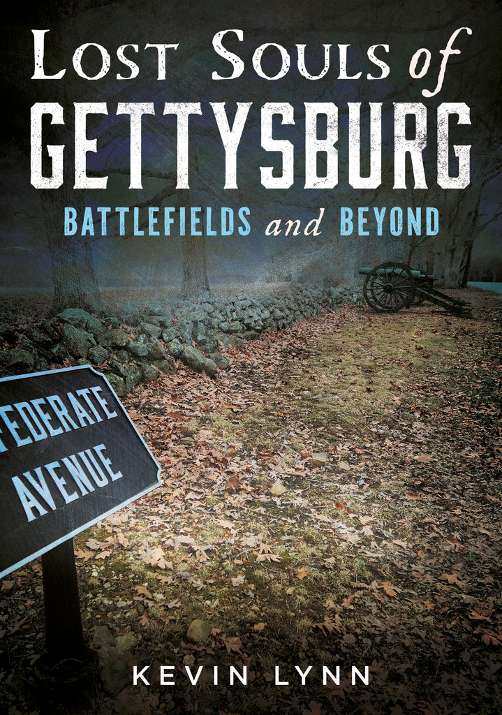 Book cover of 'Lost Souls of Gettysburg: Battlefields and Beyond' by Kevin Lynn with a dark, misty battlefield scene. Published by America Through Time - an imprint of Sutton Publishing Inc.