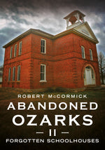 Book cover of 'Abandoned Ozarks II: Forgotten Schoolhouses' by Robert McCormick featuring a red brick schoolhouse.