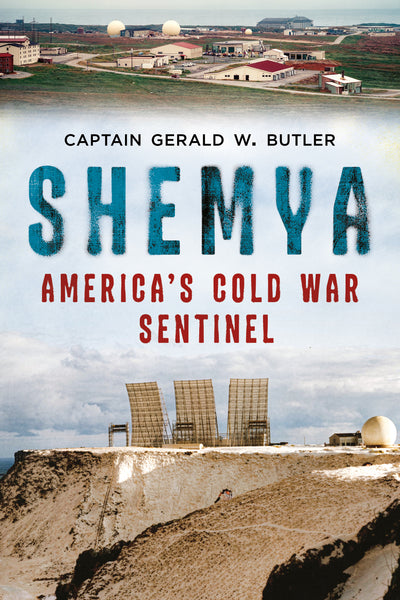 Book cover for 'Shemya: America's Cold War Sentinel' by Captain Gerald W. Butler, featuring a historical aerial photograph of a military base at the top, large textured blue title text, and red subtitle text over a cloudy sky, with radar dishes and a cliff at the bottom.