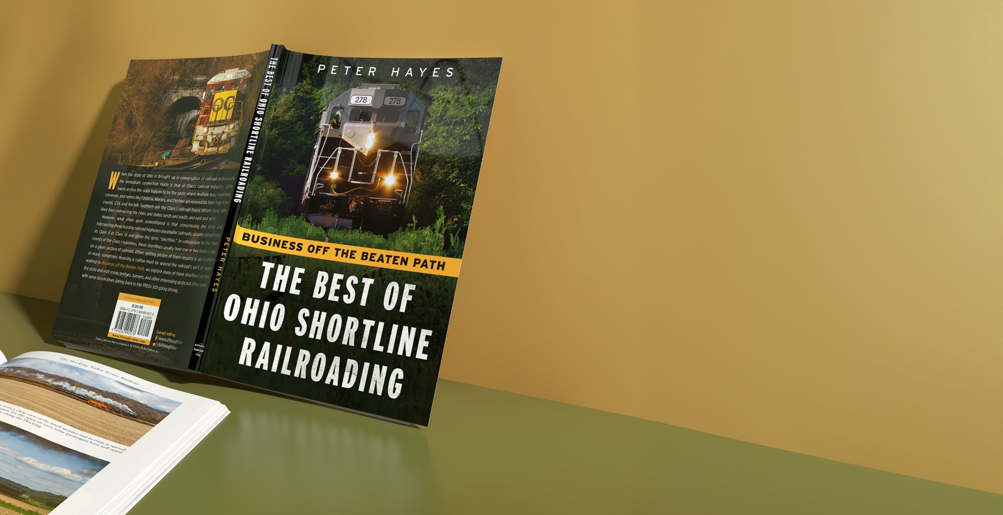 Book titled 'The Best of Ohio Shortline Railroading' by Peter Hayes on a green surface with a brown background. Published by America Through Time - local history publisher, an imprint of Sutton Publishing Inc.