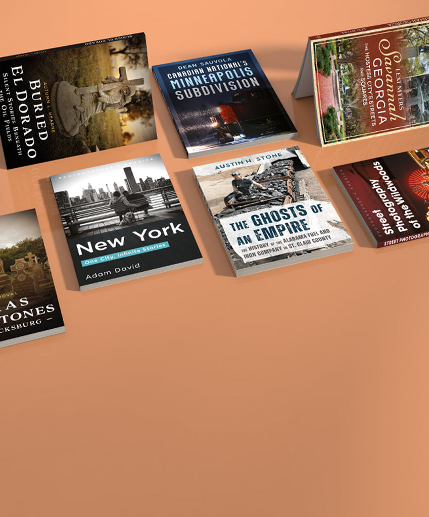 Collection of books on a textured surface