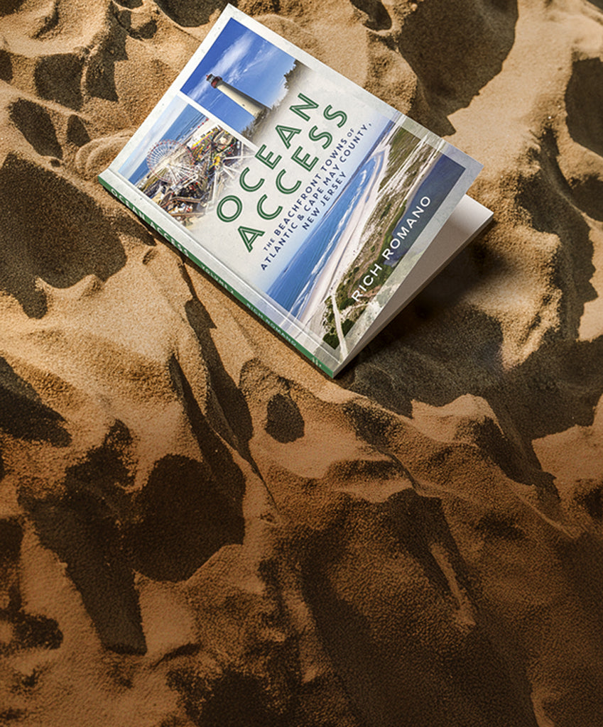 Book titled 'Ocean Access' by Rich Romano on a textured surface. Published by America Through Time.