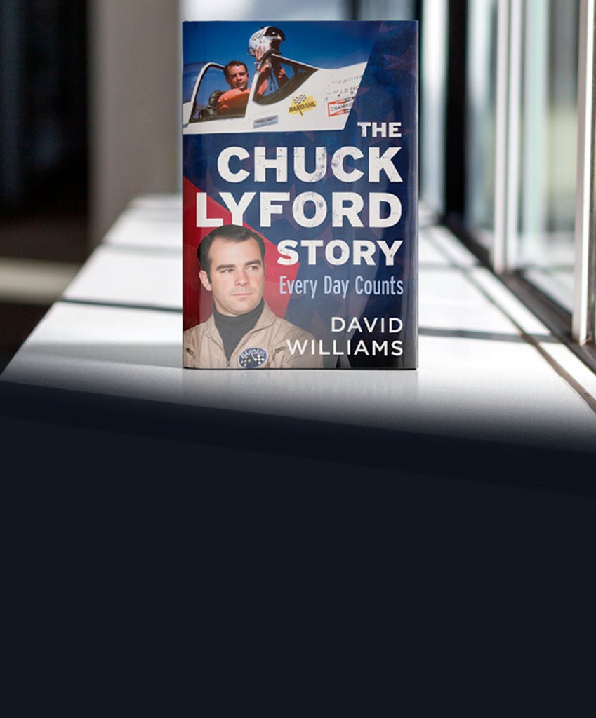 Book titled 'The Chuck Lyford Story: Every Day Counts' by David Williams on a reflective surface. Published by America Through Time - an imprint of Sutton Publishing Inc.